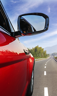 photo of a car on the road