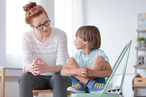 Staff talking to a child