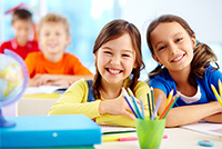 Two girls in a classroom